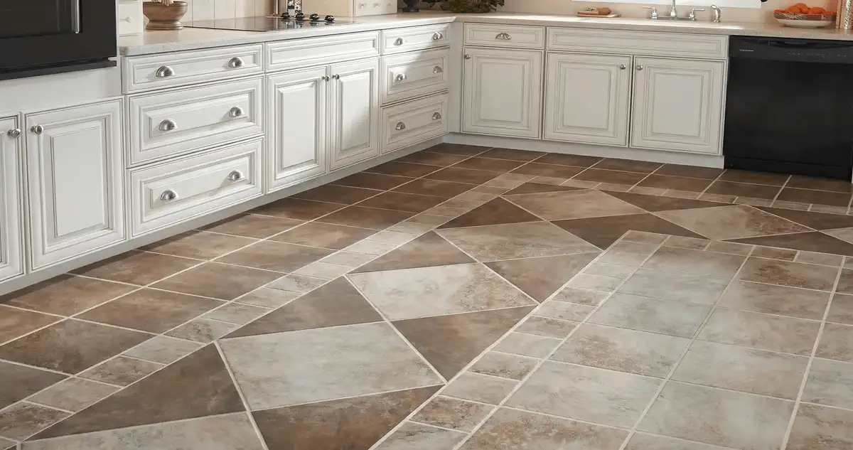Kitchen with white cabinets and a professionally installed tile floor in Akron, OH