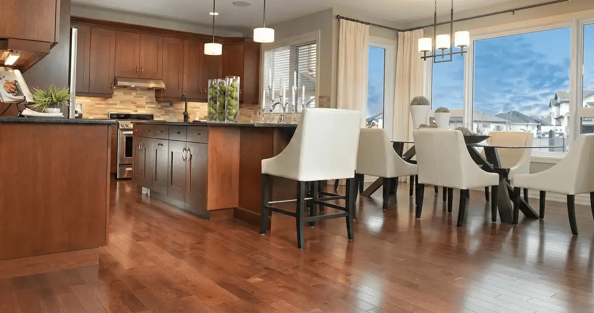 A modern kitchen with professionally installed wood flooring in Akron, OH
